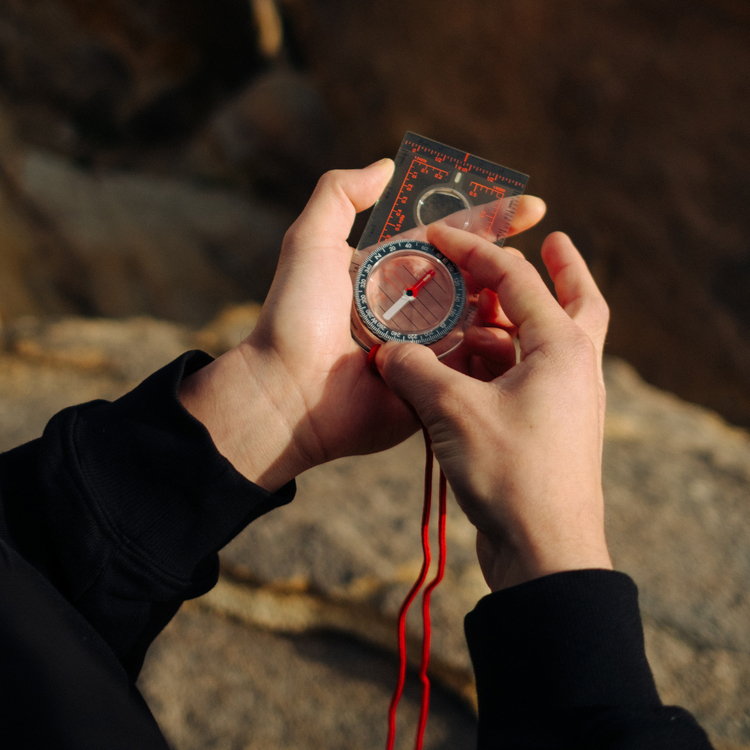 Man using a Sun Co ProMAp Compass